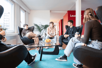 After-work beer among apprentices in a cozy atmosphere
