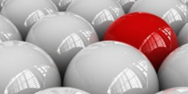Prominent red ball and gray balls all around.
